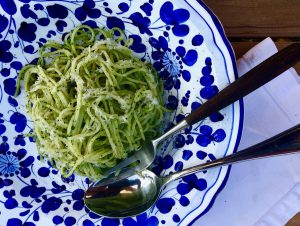green pasta in a bowl