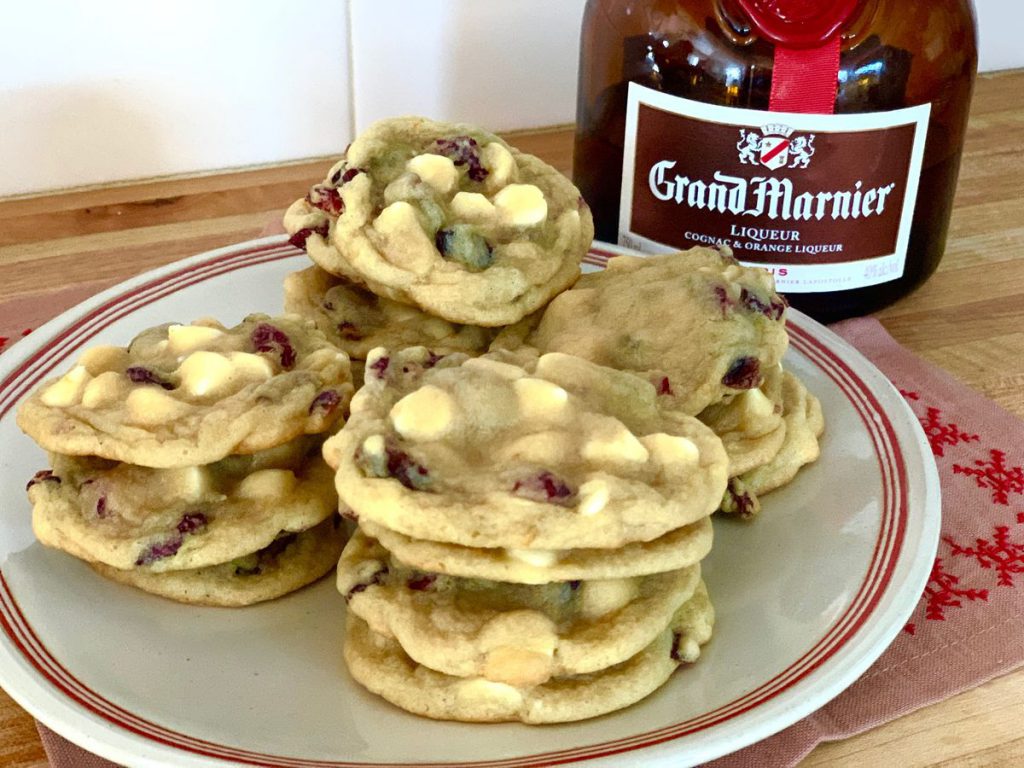 plate of cookies with a liquor bottle