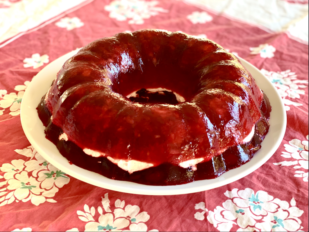 Red Jell-o salad ring on a plate