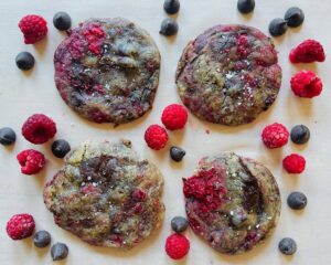 four flat chocolate-raspberry cookies