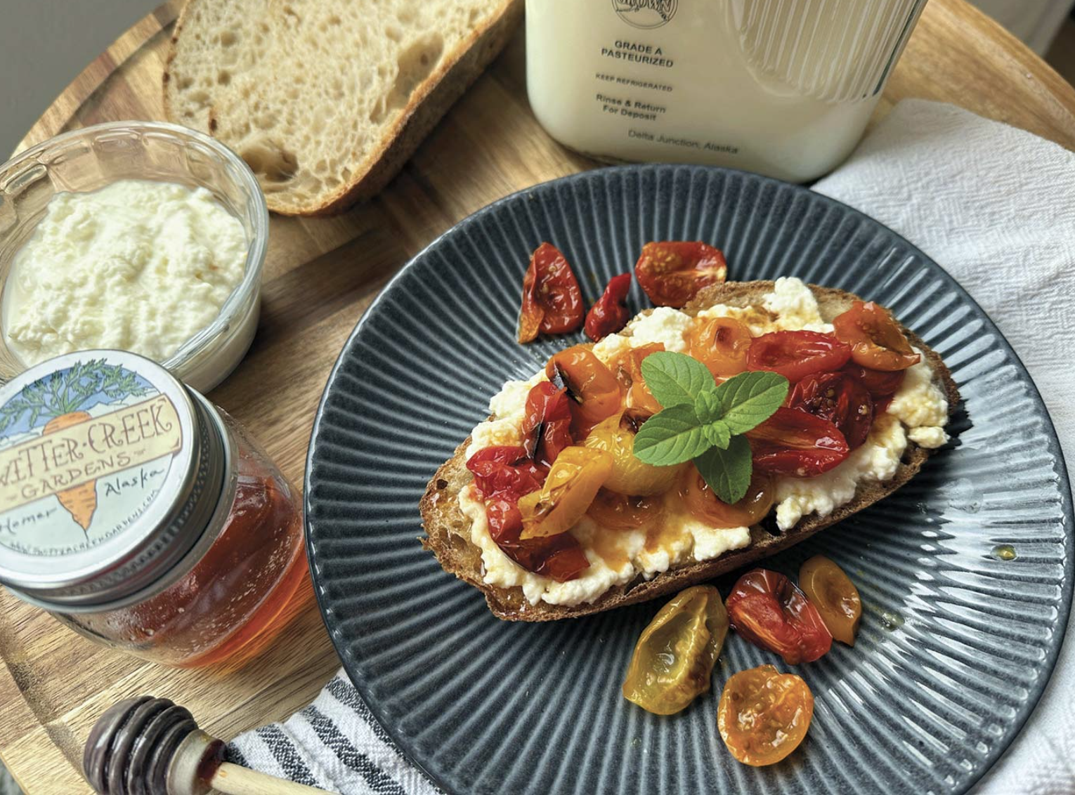 Homemade ricotta and honey-blistered tomatoes. (Julia O'Malley photo)